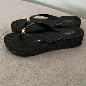Michael Kors Black Sandals with Gold Emblem